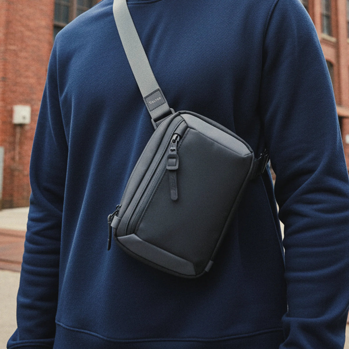 Sling Bag with Faraday Sleeve worn across the chest