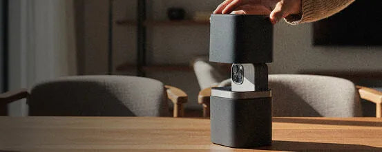 Velter Faraday capsule on a table next to a sofa