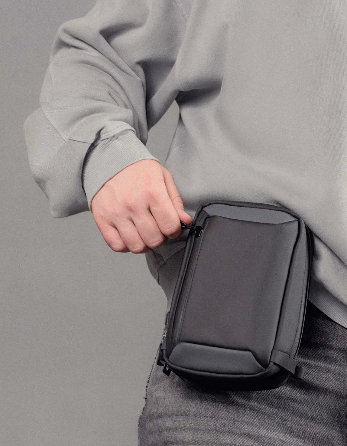 Sling bag worn on the belt